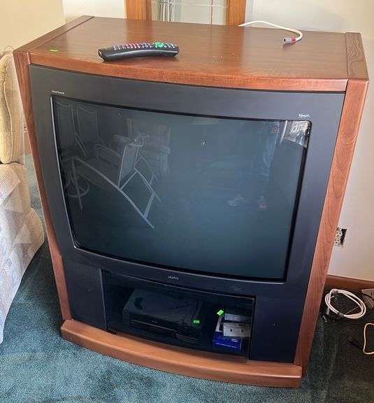 RCA Home Theatre TV in 39.25”x45.5”x21.25” with Magnovox VHS