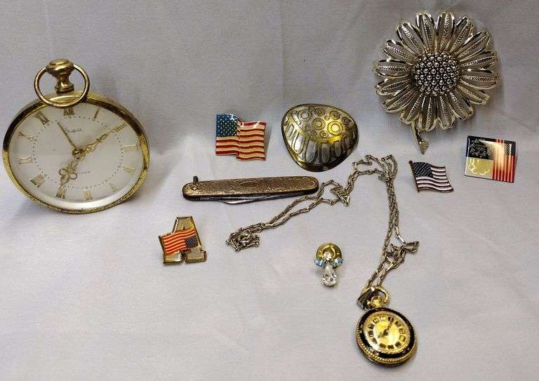 American flag pins, Sheffield alarm clock, pins Metzger Property Services LLC