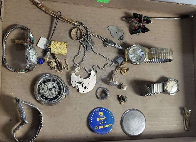 Watches, Buttons and Ring Assortment Metzger Property Services LLC