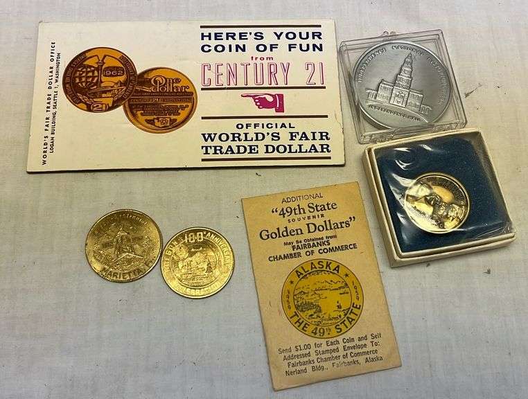 Souvenir coins Metzger Property Services, LLC