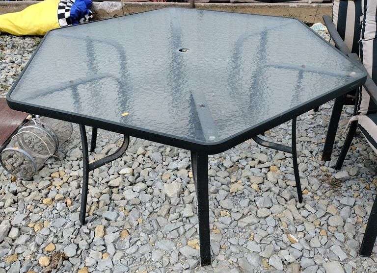 Glass top outdoor hexagon shape patio table 60”x52”x29” Metzger