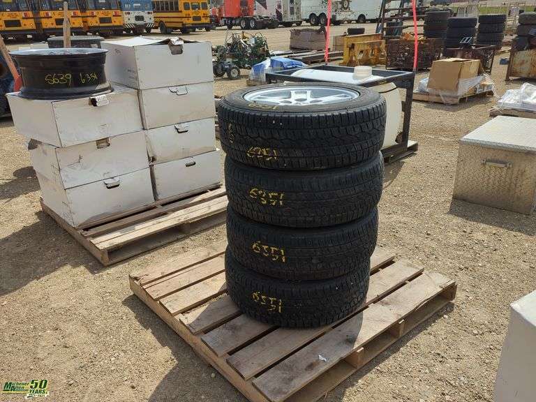 235/60R18 Tires and Rims Qty 4 Michener Allen Auctioneering Ltd