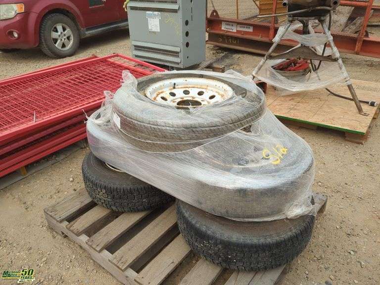 ST235/80 R16 Tires on Rims - Michener Allen Auctioneering Ltd