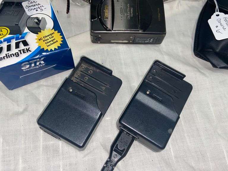 Cameras and chargers McLaughlin Auctioneers, LLC