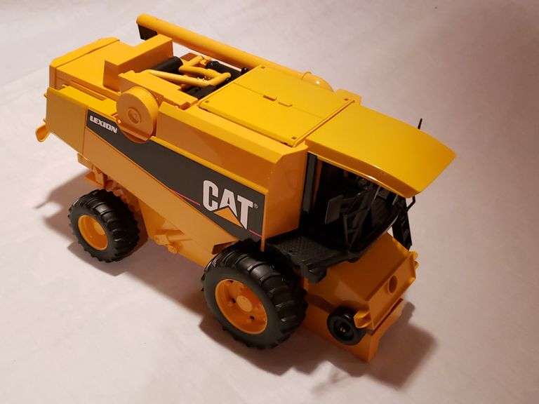 All Plastic Lexion CAT Combine McLaughlin Auctioneers, LLC