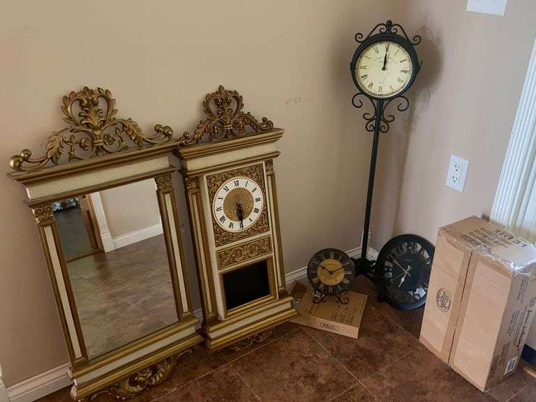 Clocks and mirror McLaughlin Auctioneers, LLC
