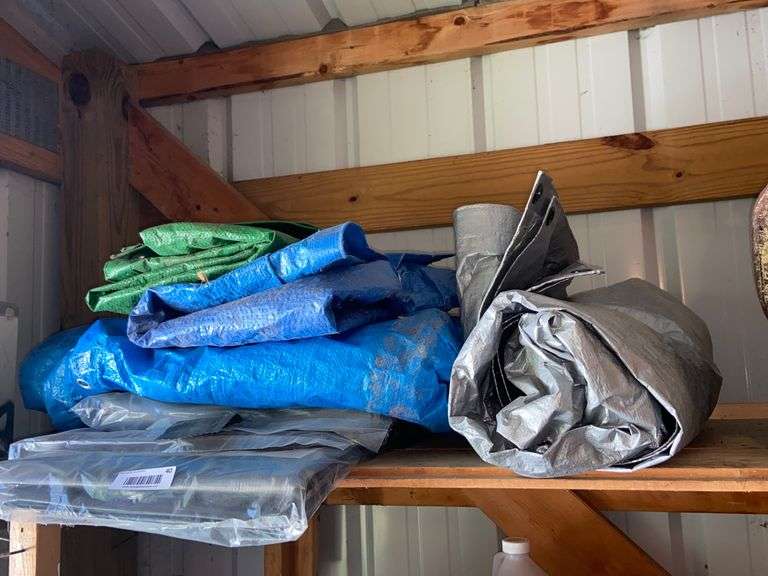 LARGE GROUP OF TARPS McLaughlin Auctioneers, LLC