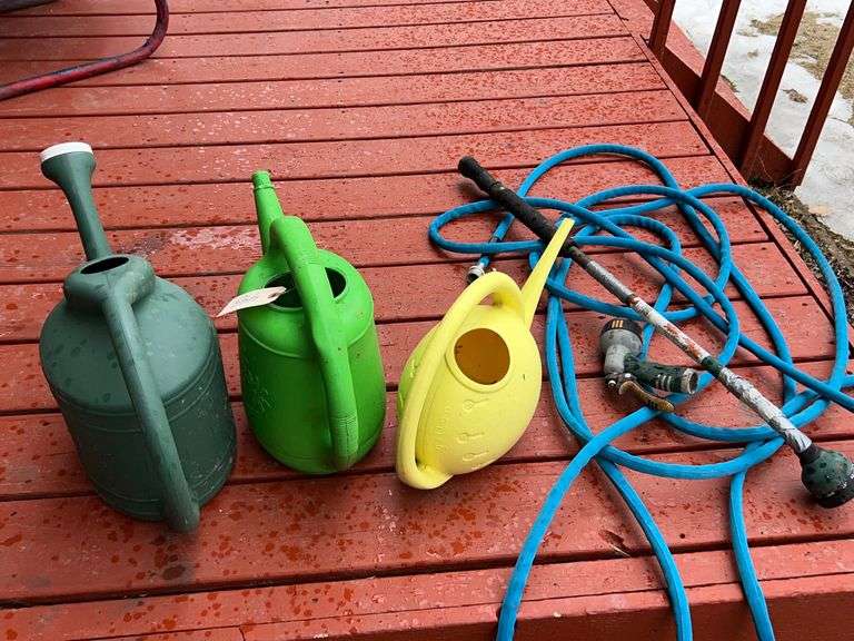 (3) WATERING CANS & A SOAKER HOSE McLaughlin Auctioneers, LLC