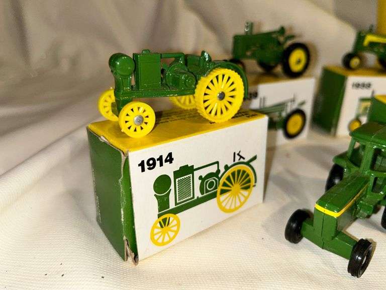 John Deere Set of 8 Miniature Tractors McLaughlin Auctioneers, LLC