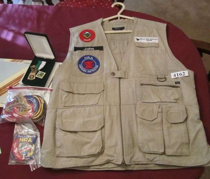 Shooting vest with NRA medal and patches Mark Van Hook, Auctioneer