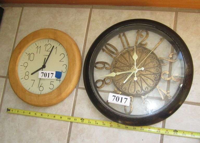 (2) wall hanging battery clocks Mark Van Hook, Auctioneer