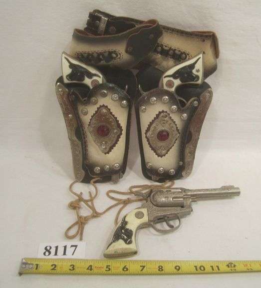 Pr. of Western cap guns with holsters & belt, & Texan Jr. cap gun