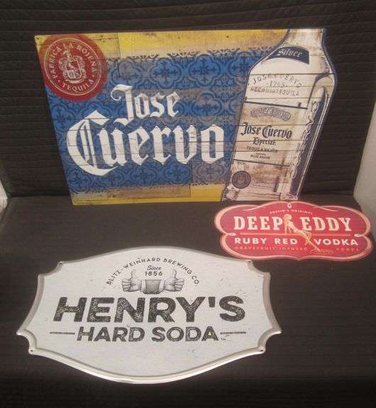 Jose Cuervo, Henry's hard soda, & Deep Eddy vodka advertising signs