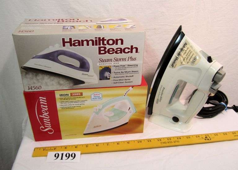 3 irons, 2 are sealed in box Mark Van Hook, Auctioneer