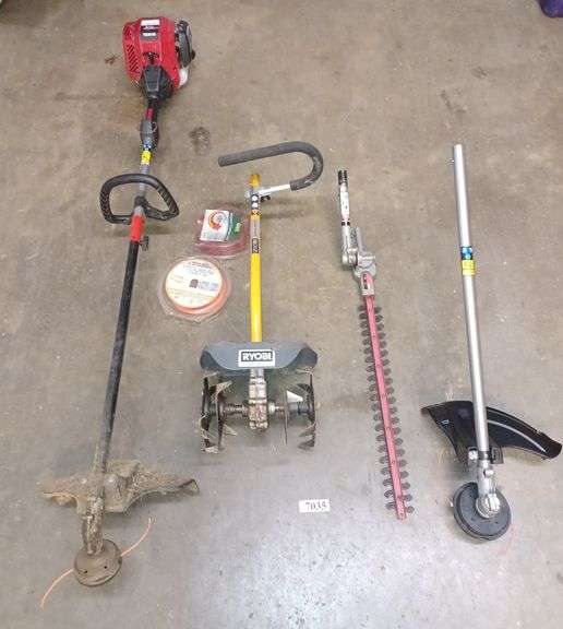 TroyBilt 4 cycle gas weed trimmer with several attachments. Mark Van