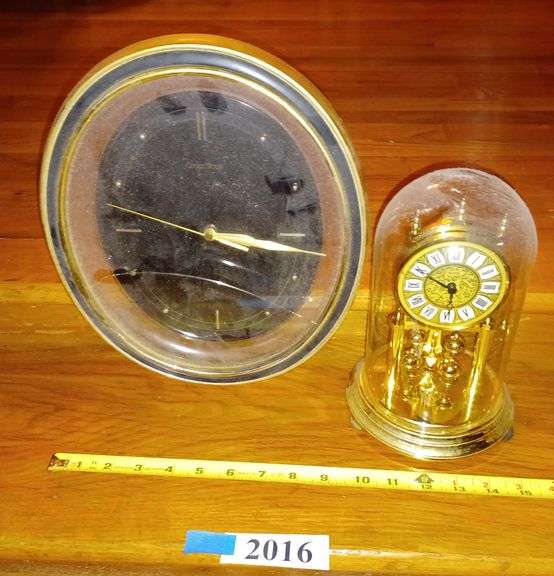 Battery operated anniversary clock, battery wall clock. Mark Van Hook, Auctioneer