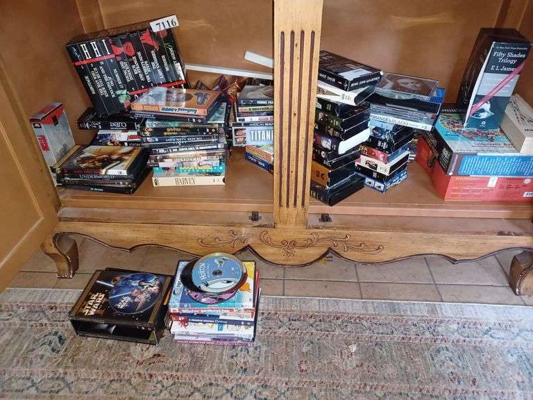 Various DVDs, VHS tapes, games Mark Van Hook, Auctioneer