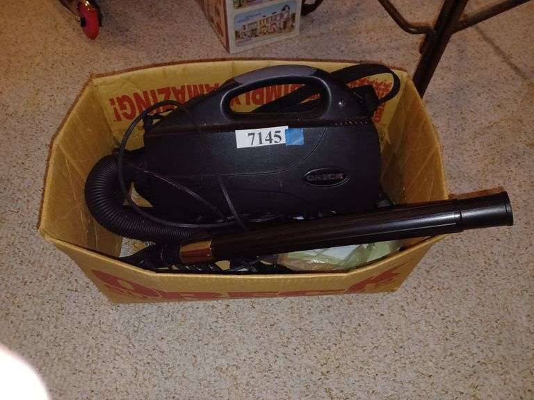 Oreck compact canister vacuum with attachments and bags Mark Van Hook