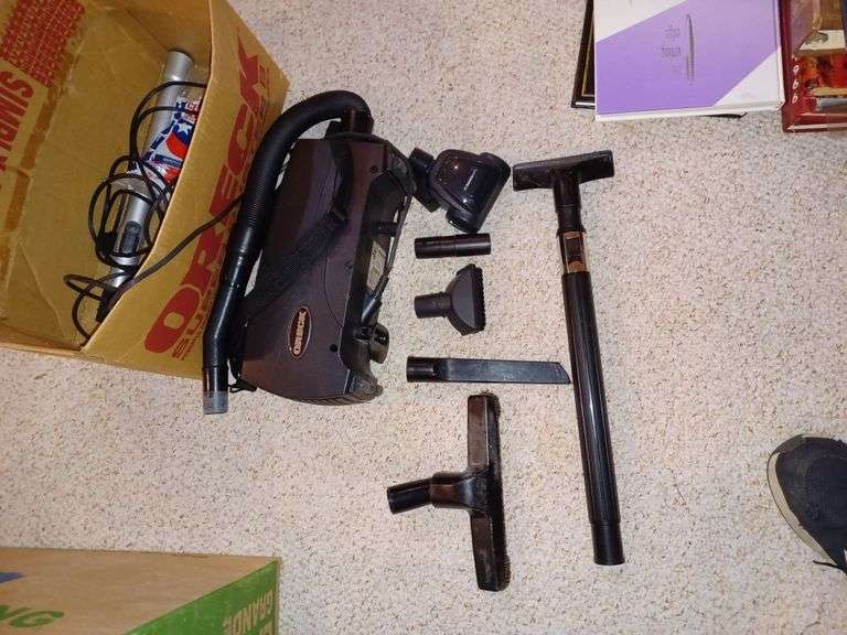 Oreck compact canister vacuum with attachments and bags Mark Van Hook
