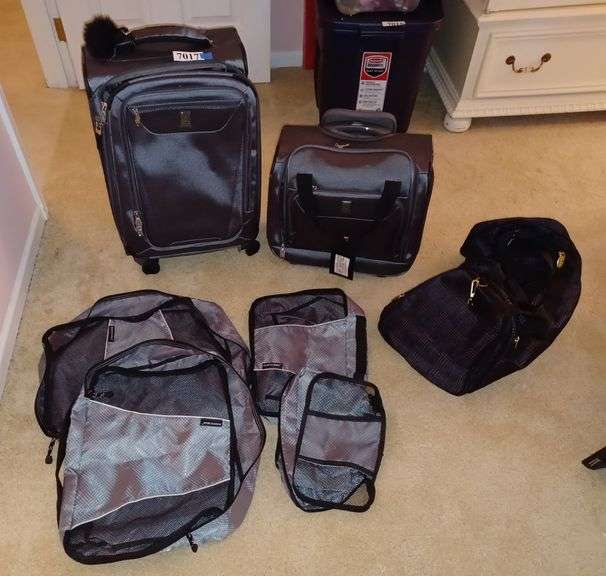 Travelpro luggage set with Sharper Image accessory bags, duffle bag