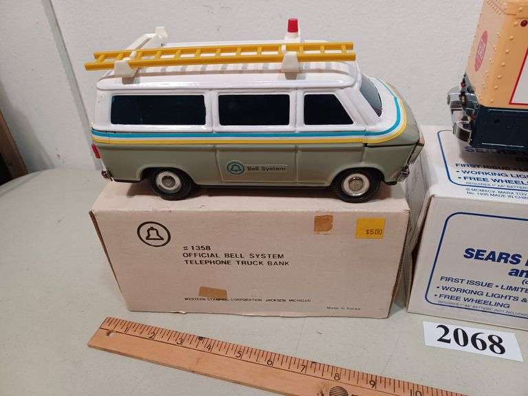 Bell Telephone van, Sears delivery van, Montgomery Wards truck, John