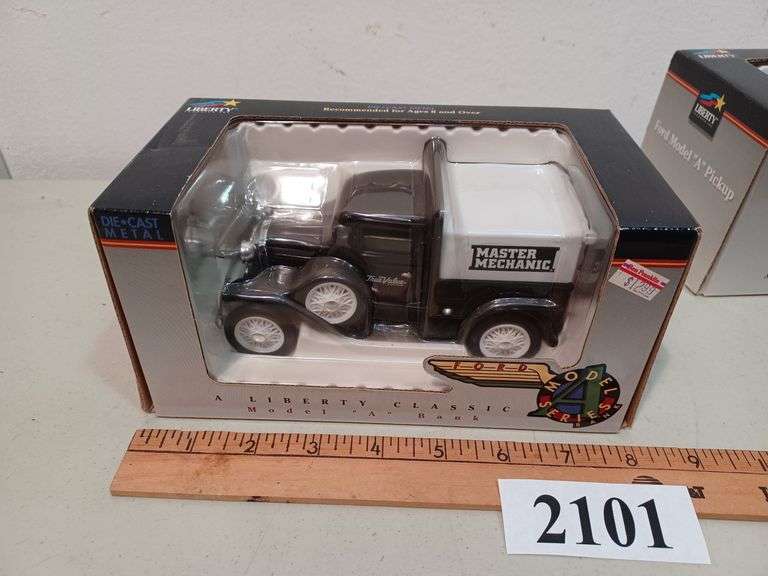 (5) Liberty and ERTL diecast truck banks in boxes Mark Van Hook, Auctioneer