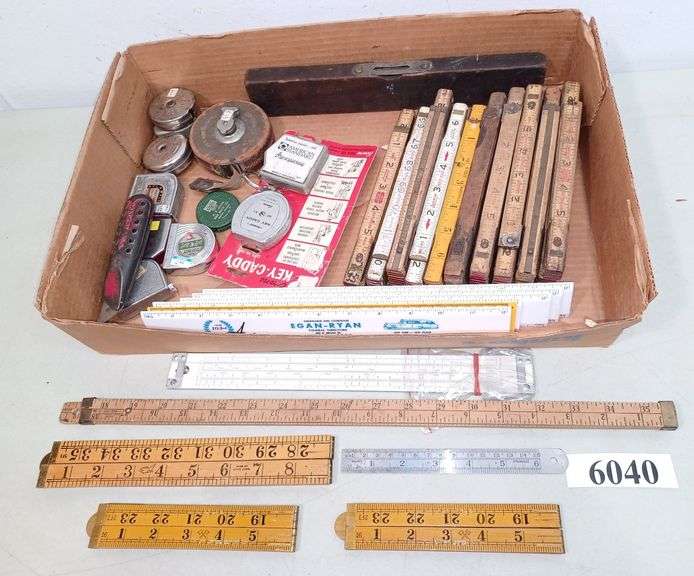 Rulers, tape measures, level, Etc. Mark Van Hook, Auctioneer