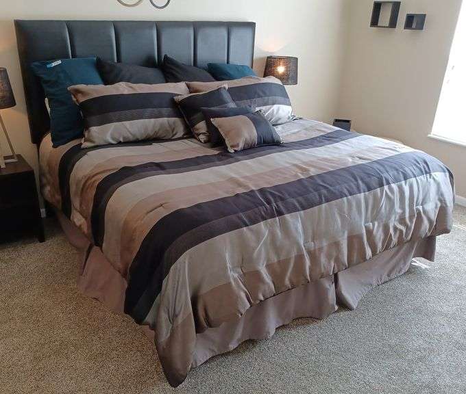 King size bed, bedding, Sealy mattress, and split box springs. Mark