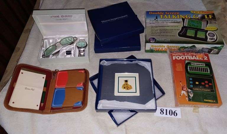 Gift set of sunglasses and watch, 2 new photo frames in boxes, two vintage electronic games, Etc
