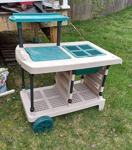 Plastic rolling potting bench. Mark Van Hook, Auctioneer