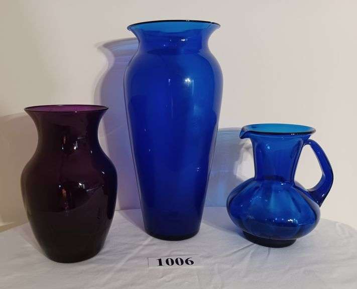 Cobalt blue glass vase and pitcher, purple glass vase with faux flower