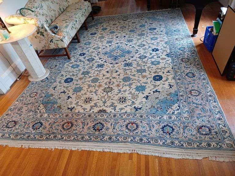 Large offwhite and blue area rug Mark Van Hook, Auctioneer