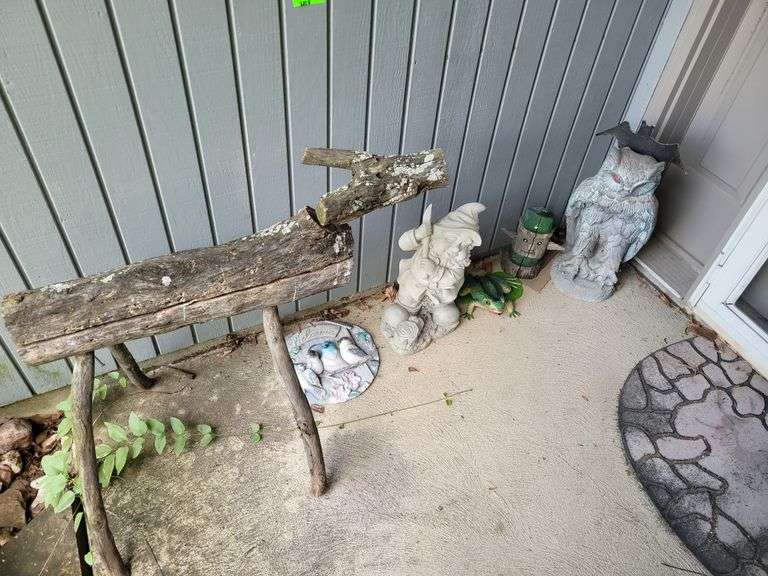 Statues on Front Porch Ness Bros Realtors & Auctioneers