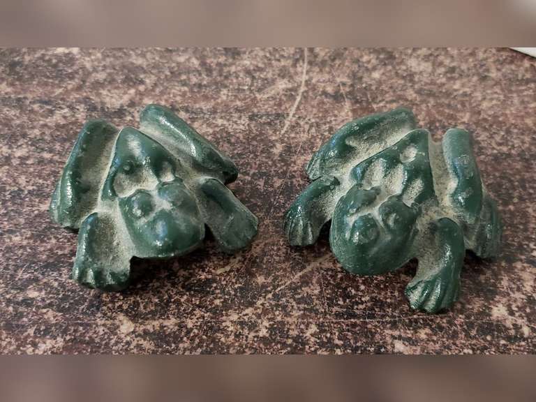 Male and female cast iron frogs Northern Kentucky Auction, LLC