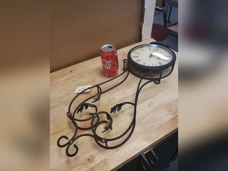 Howard Miller battery operated wall clock Northern Kentucky Auction, LLC