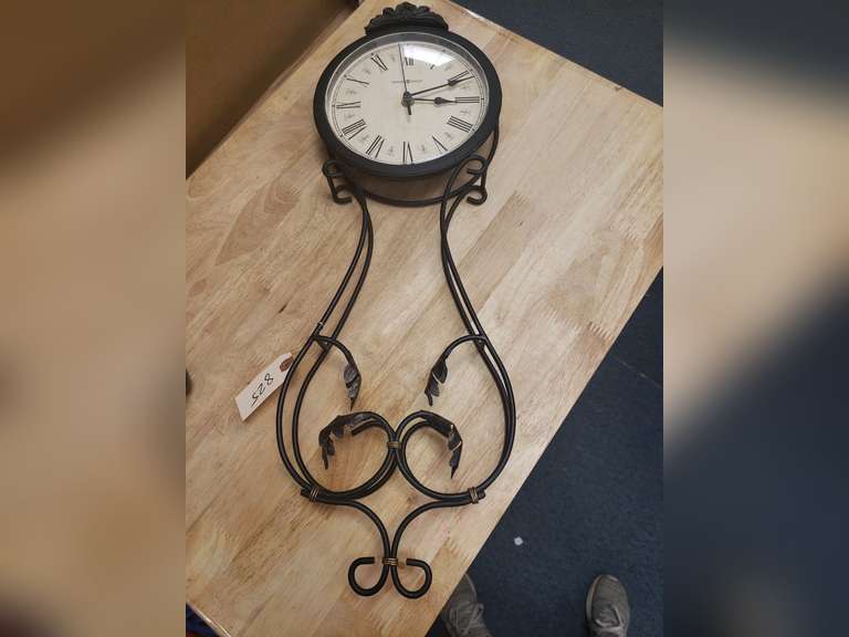 Howard Miller battery operated wall clock Northern Kentucky Auction, LLC