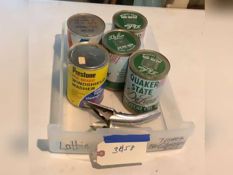 4 Quarts of oil, 1 windshield washer fluid and 2 oil spouts.