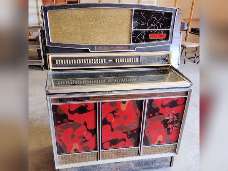 Wurlitzer jukebox, blow molds, 2008 Cadillac, furniture, signs, L&N RR lantern, tube and transistor radios, lamps, household, antiques, pottery, art glass, books.