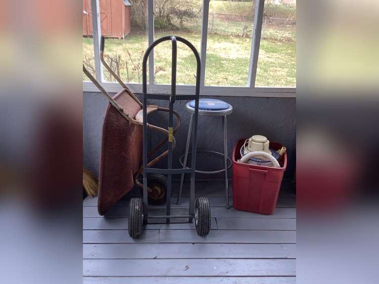 Wheelbarrow, dolly, work stool and outdoor vac.