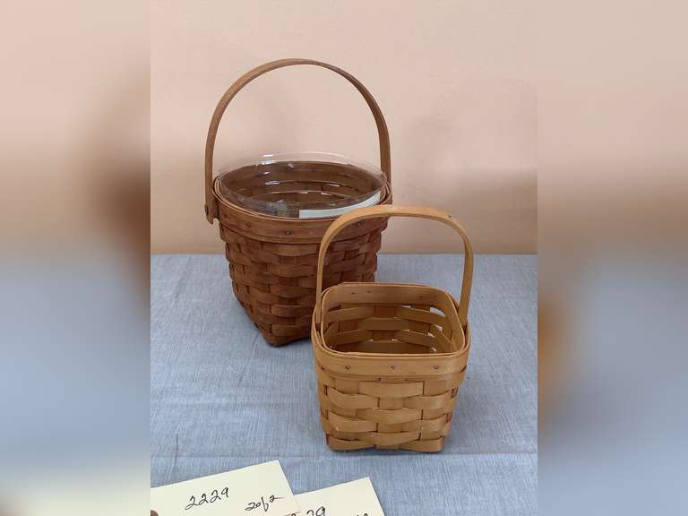 2 Longaberger baskets, one with liner. Dated 1990 & 1998. 8” & 5”.