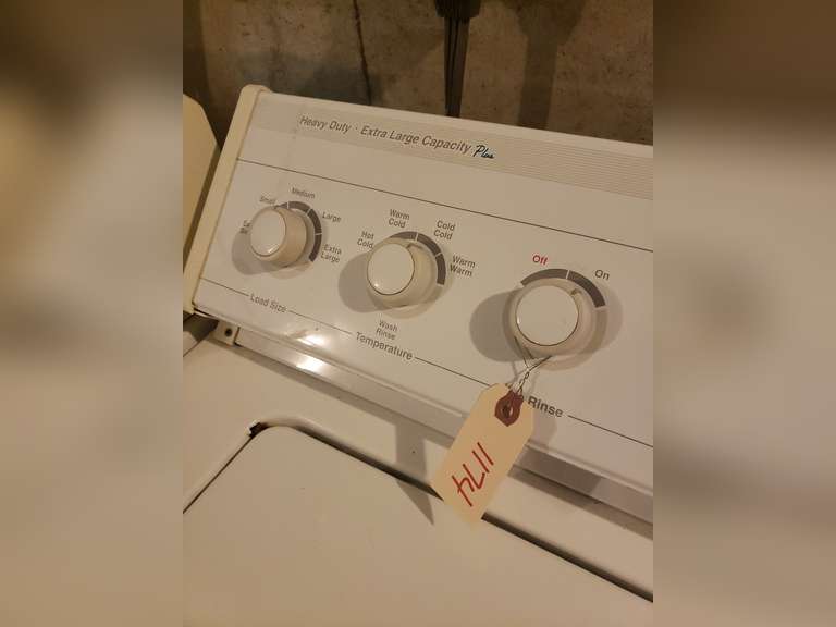 Whirlpool heavy duty extra large capacity washer, powered on (B