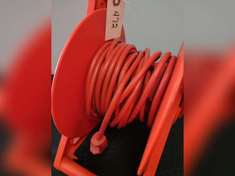 Extension cord roller with cord Northern Kentucky Auction, LLC