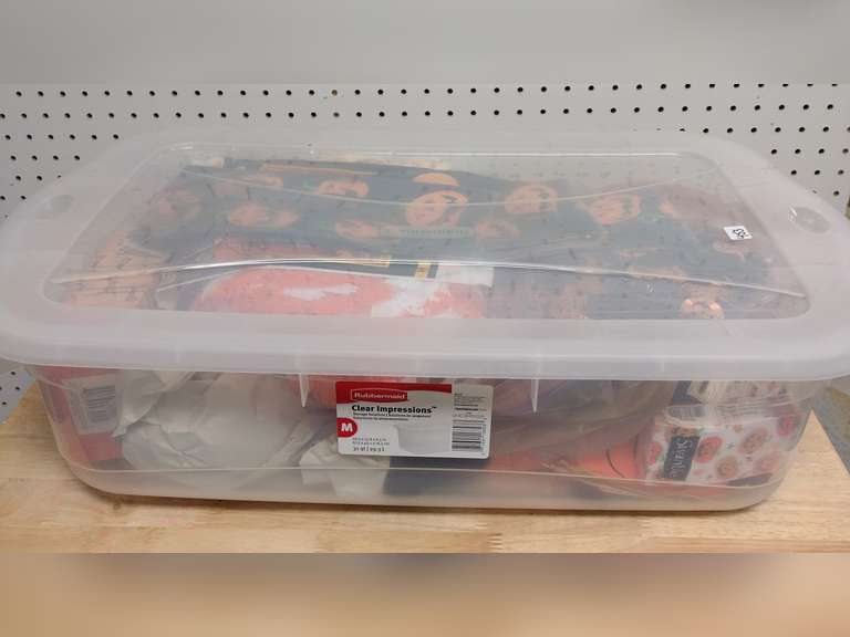 Rubbermaid 31 quart tote of Halloween decorations.