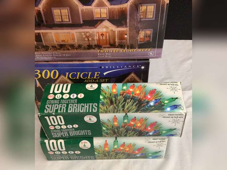 2 Boxes 300 icicle lights, new unopened and 2 boxes of 100 multi