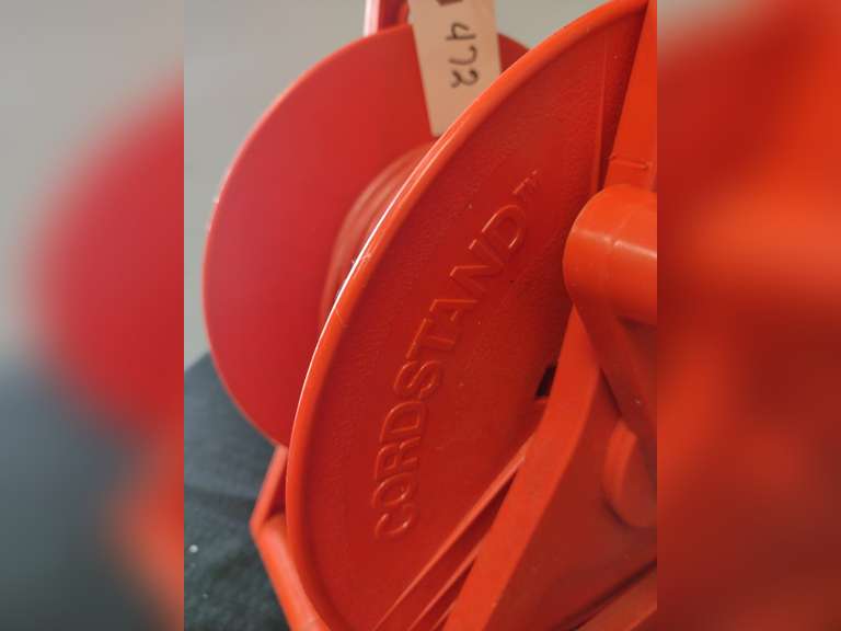 Extension cord roller with cord Northern Kentucky Auction, LLC