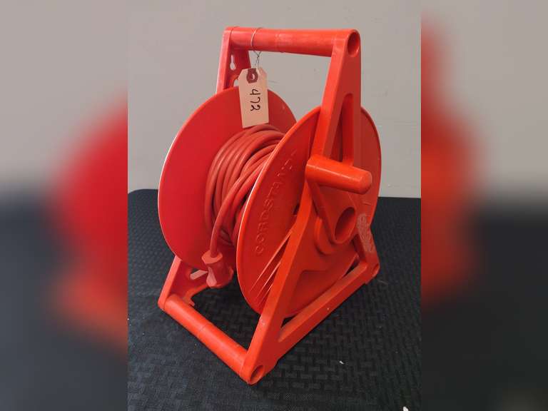 Extension cord roller with cord Northern Kentucky Auction, LLC