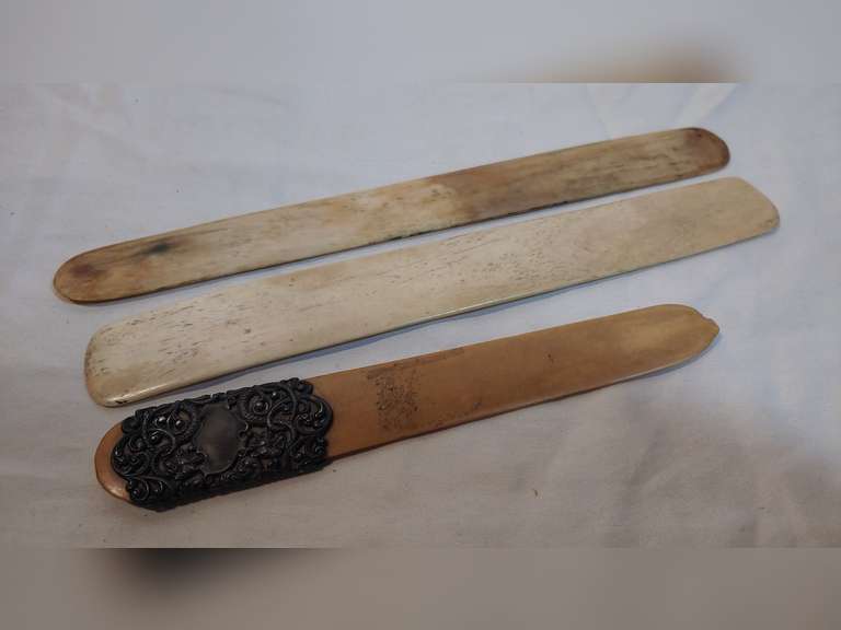 Antique Beer Foam scrapers2 are believed to be bone and one with a