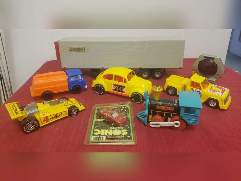 JB Hunt toy trailer, plastic cars and more Northern Kentucky Auction, LLC