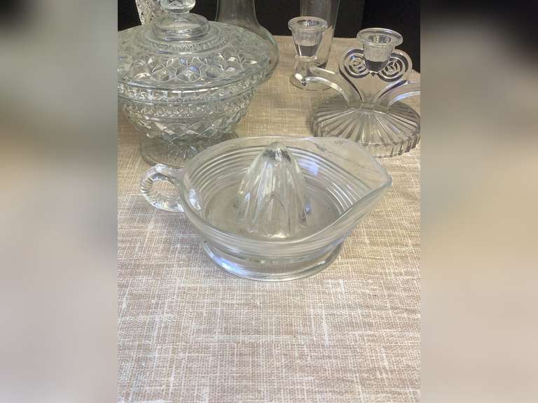 11 Edged champagne glasses, candy dish, hand juicer, candle stick