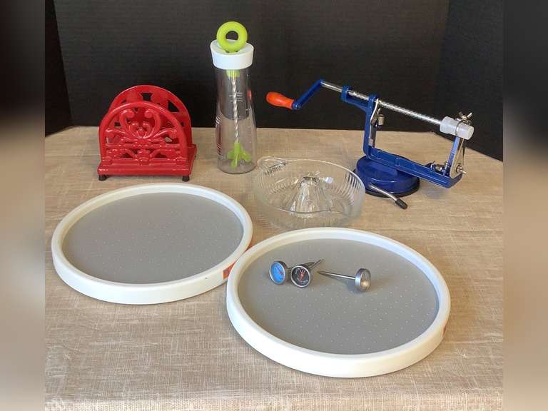 Apple peeler, salad dressing mixer, cast iron napkin holder, juicer, 2